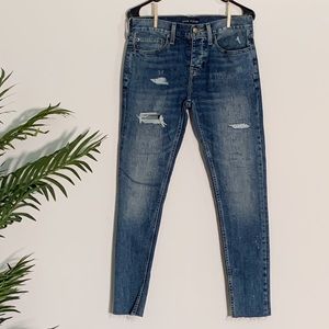 Blue cotton distressed skinny jeans